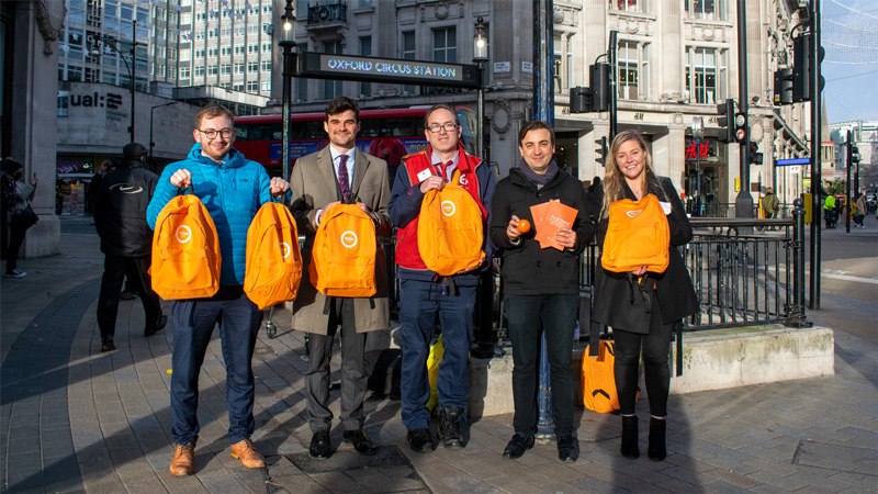 A photograph of London Underground and Thrive LDN staff launching the grab bags at Oxford Circus station
