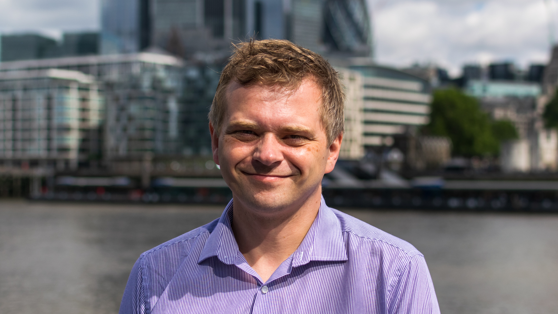 A head and shoulders image of Glyn Cridland with the London backdrop.